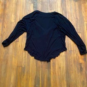 Free People black long sleeve top. Size S.